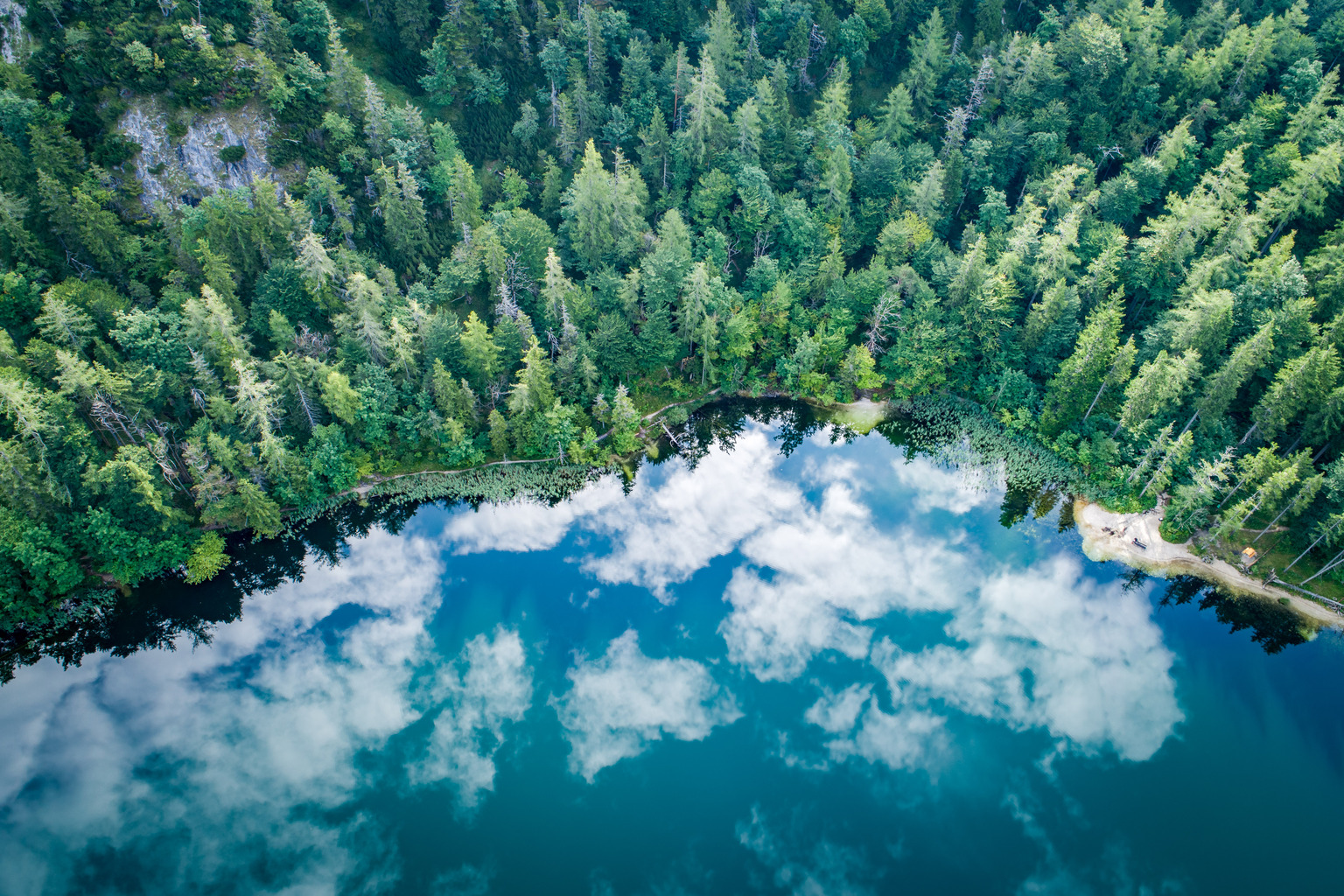 Aerial view at lake Eibensee, a beautiful small mountain lake in the Austrian Alps near Salzburg.