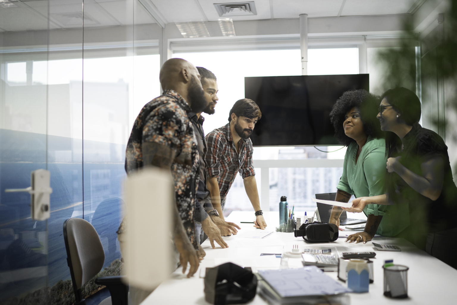 Business team discussing plans during business meeting