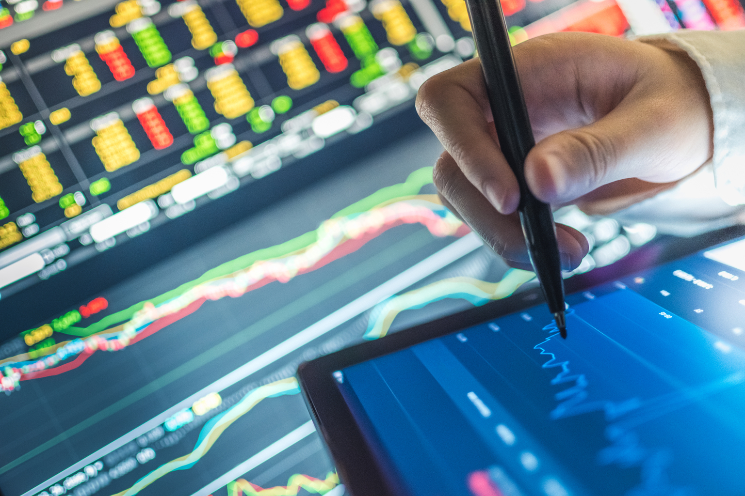 Business analysis stockmarket chart in tablet and computer for investment in crisis and finance business planning selective stock , cryptocurrency , and fund for Stockmarket crash and Financial crisis