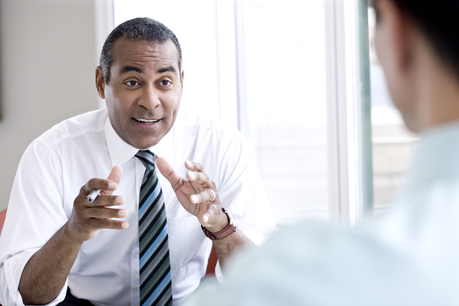 Businessman talking and gesturing