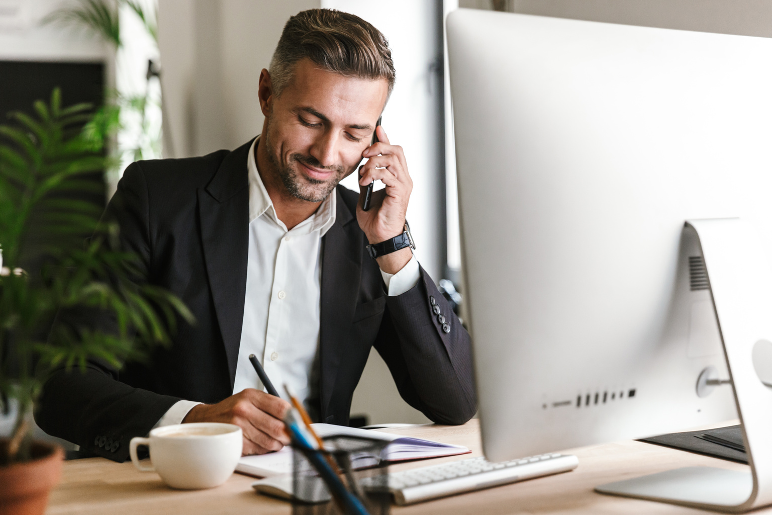 Businessman talking on cell phone