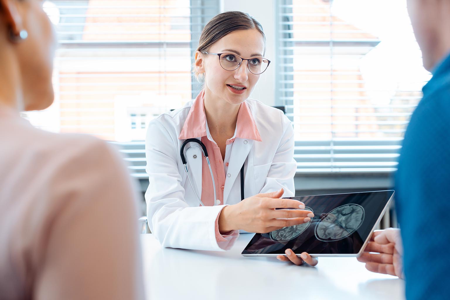 neurologist with patient