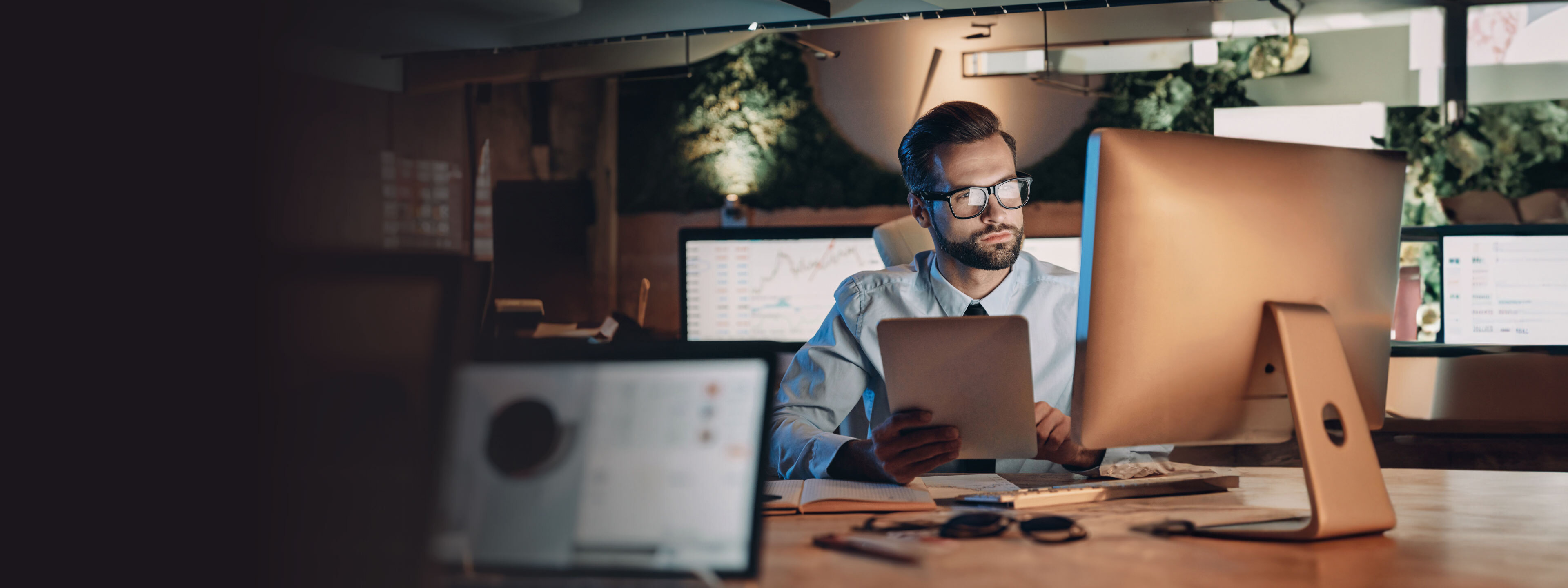 Confident young man working on computer