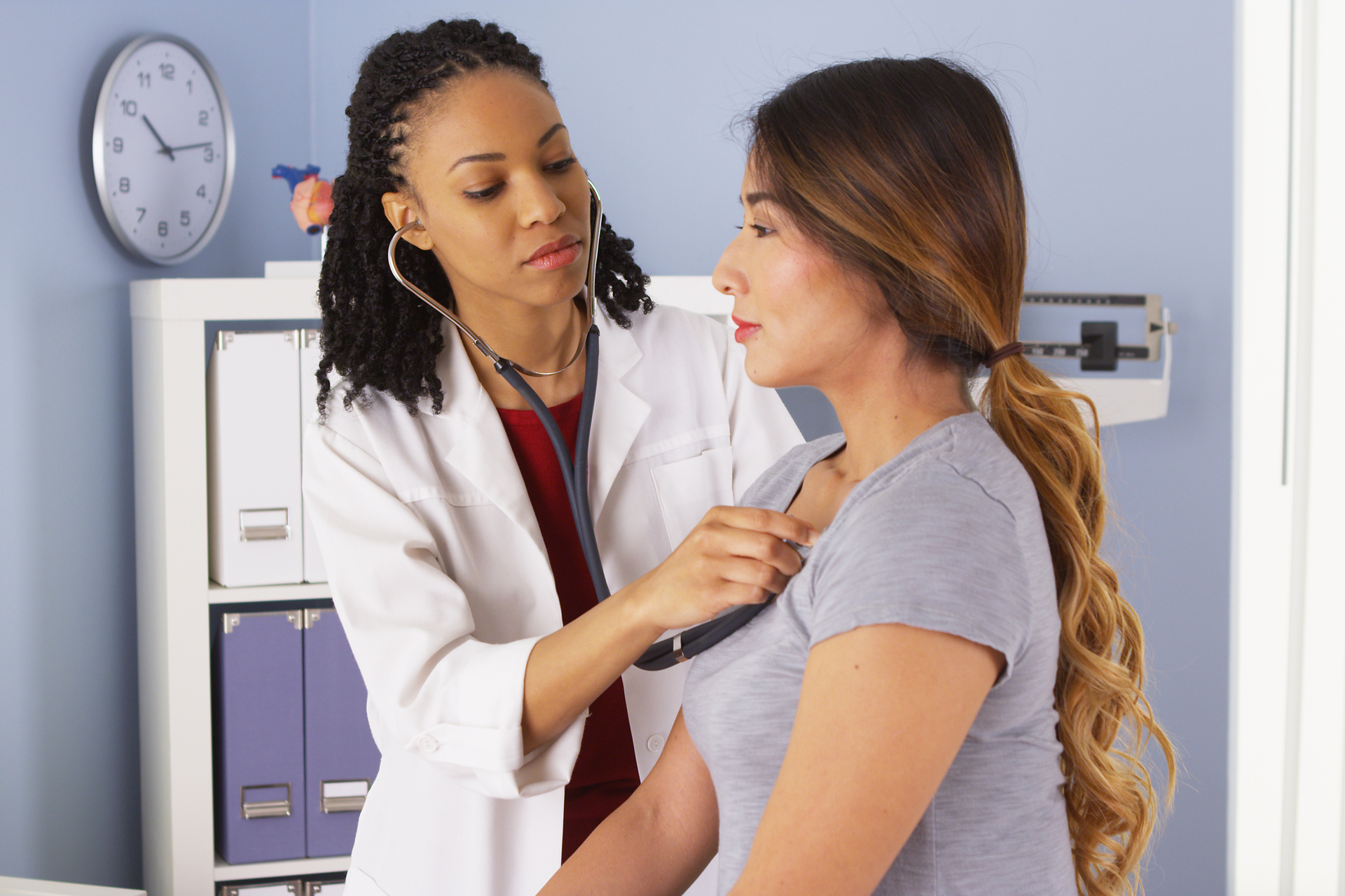 Healthcare worker providing exam