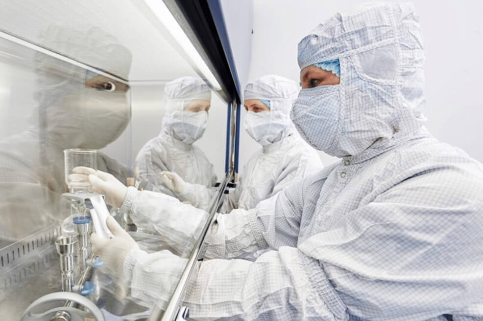 Technician in the cleanroom hood