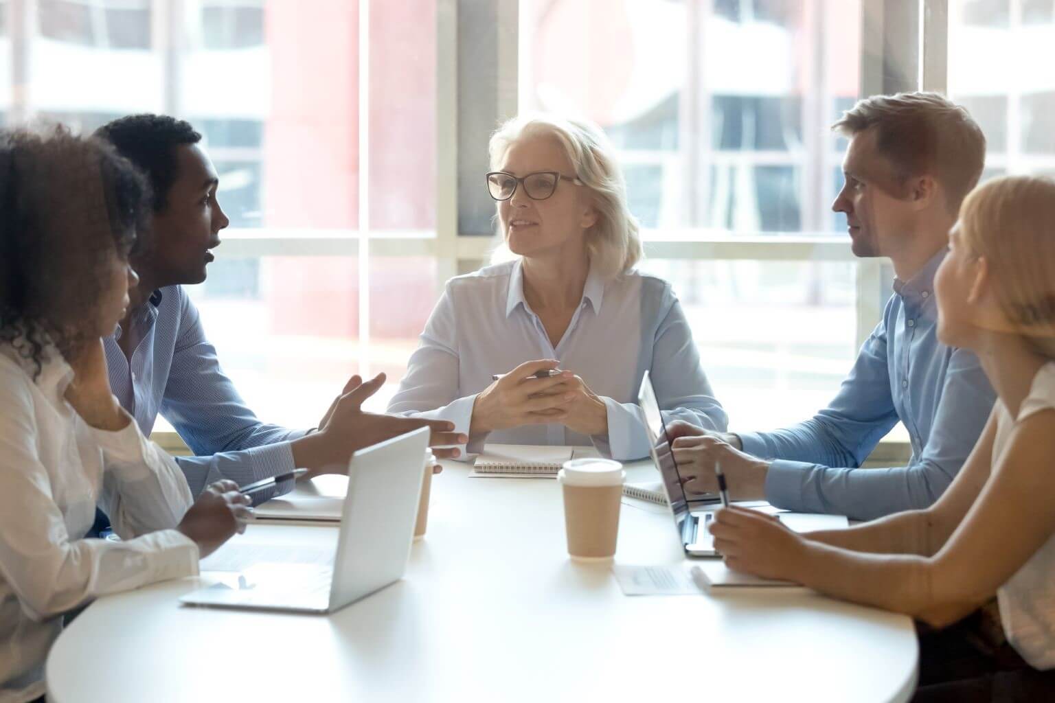 Employees meeting at conference table