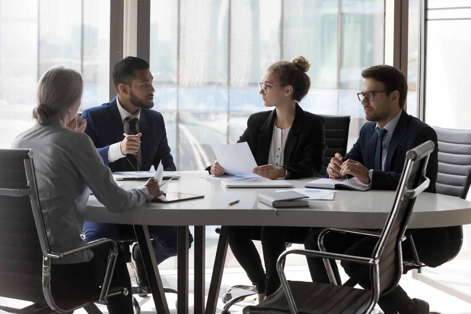 people discussing in a meeting