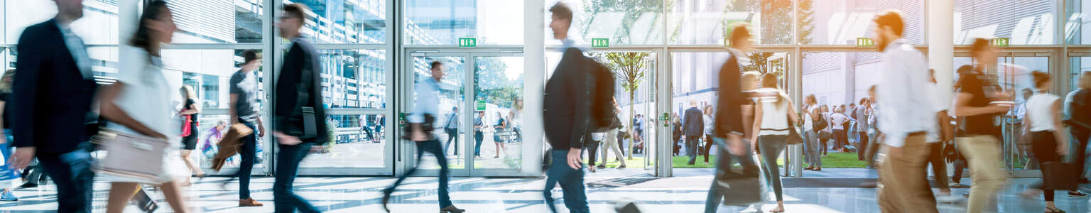 businesspeople walking, slightly out of focus and blurry