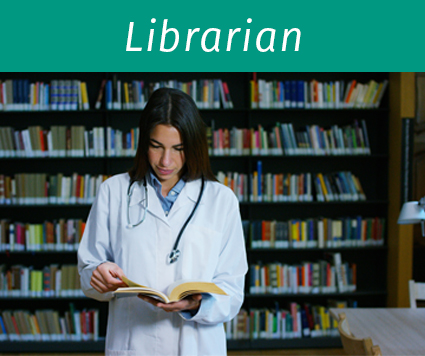 Female doctor in a library holding open book
