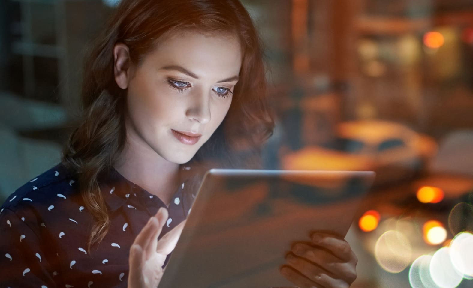 Woman looking at tablet