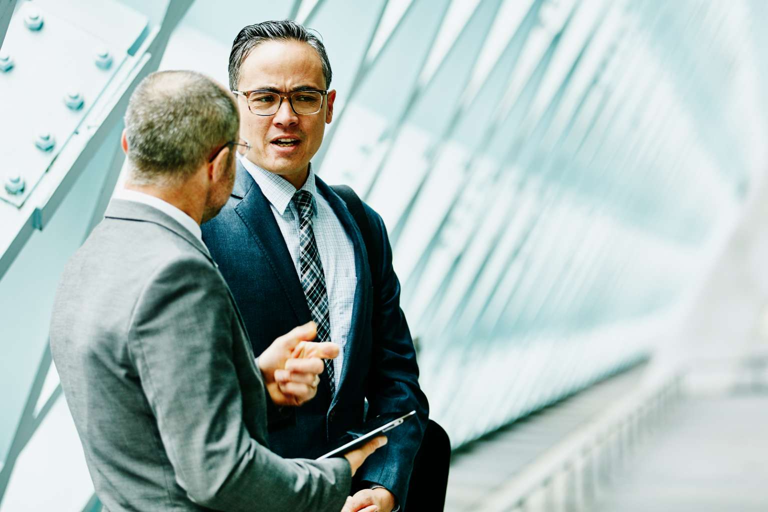 Two businessmen talking