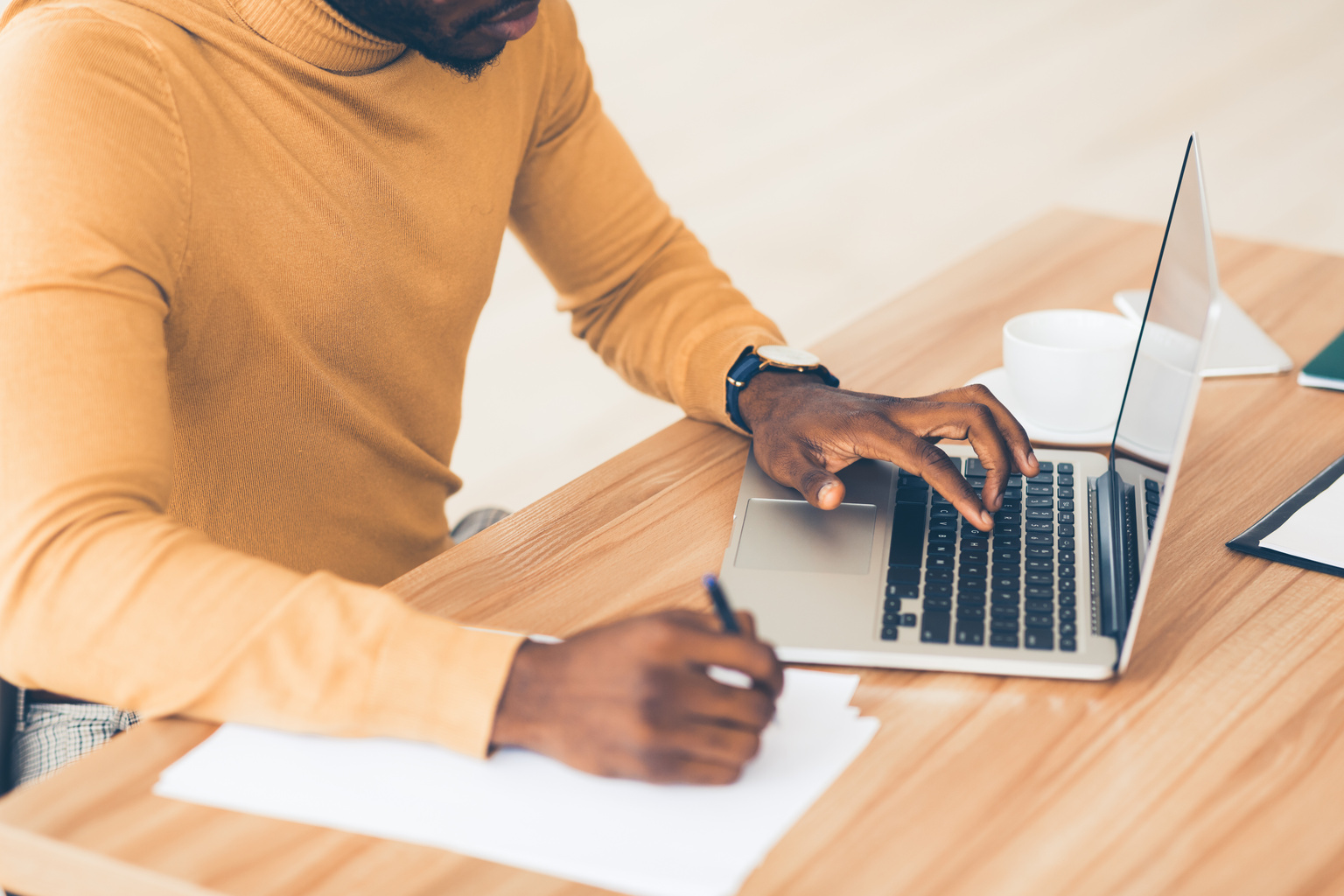 Person using laptop to conduct research