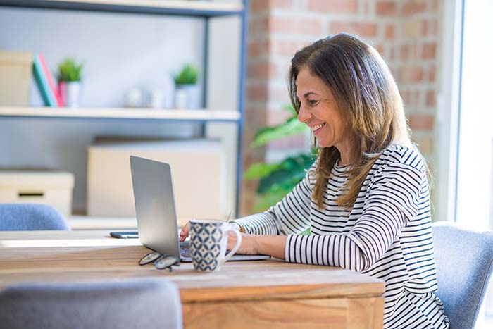 Woman in front of laptop