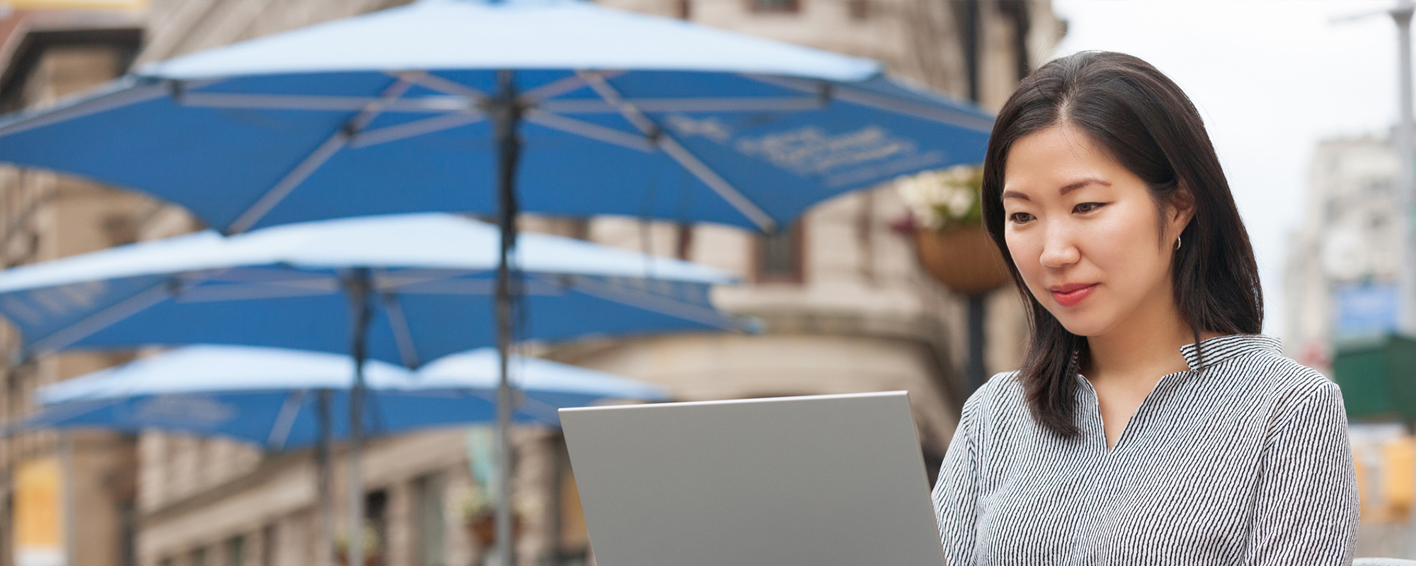 Woman typing on laptop