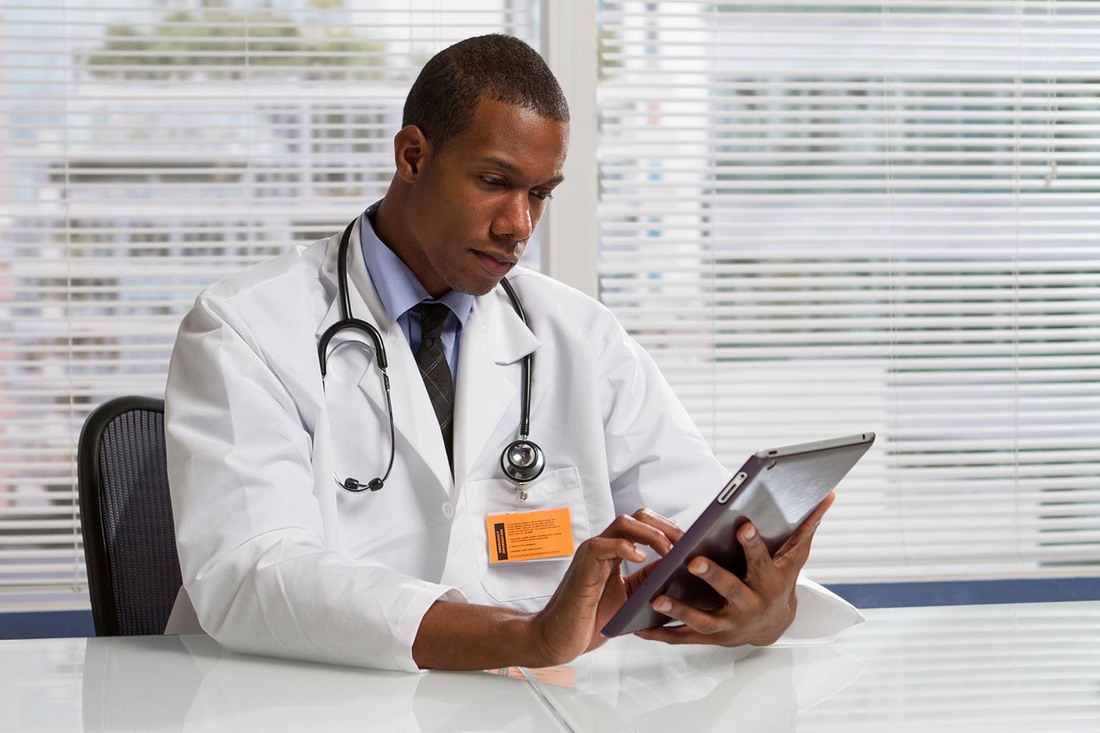 doctor on tablet