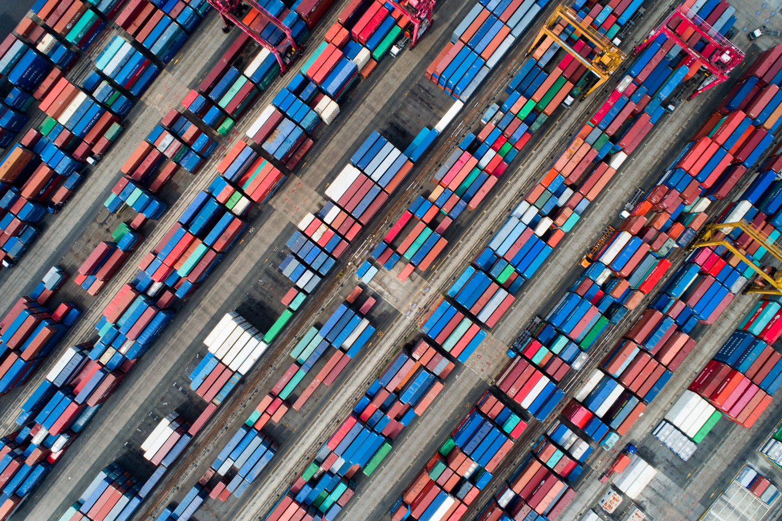 Shipping containers sit stacked in this aerial photograph taken above a port in South Korea. Photographer: SeongJoon Cho/Bloomberg