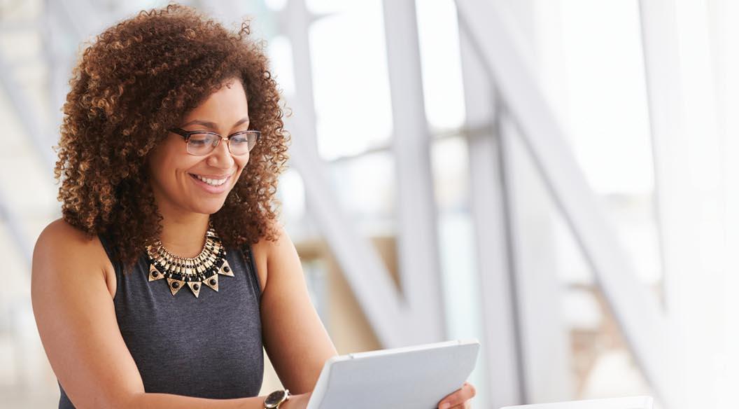 woman looking into a computer