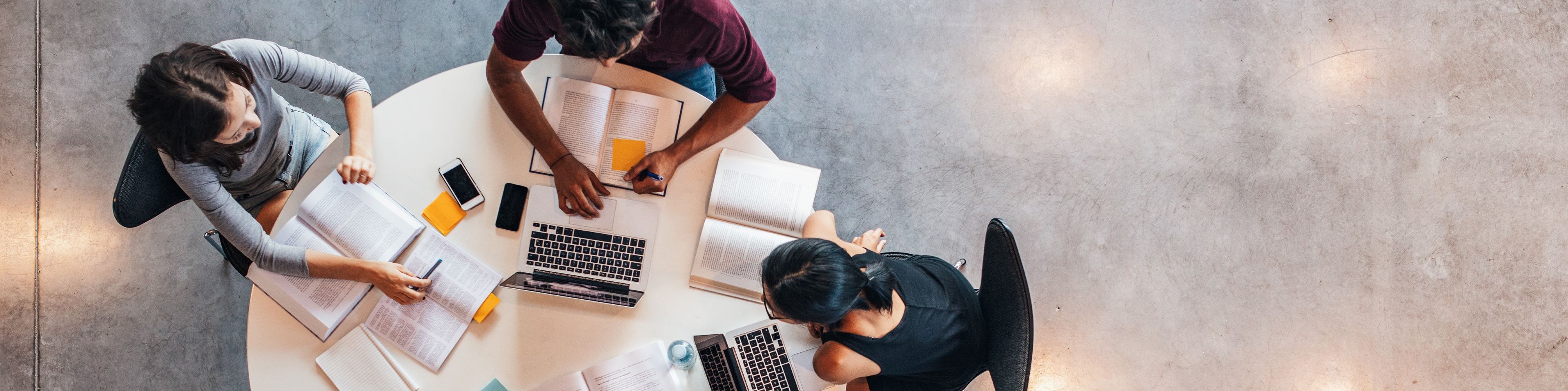 Students studying around a table.