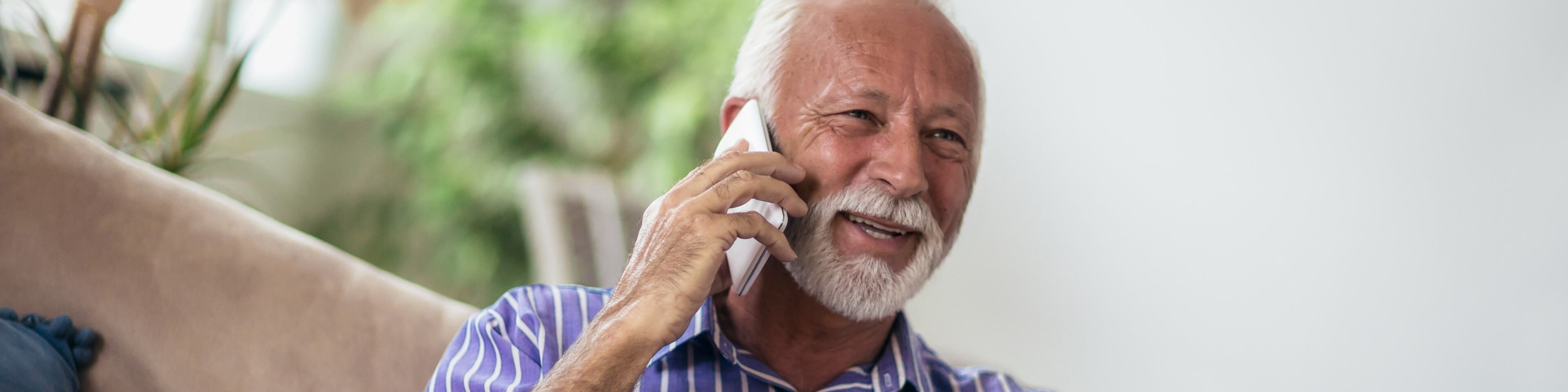 Older man using phone