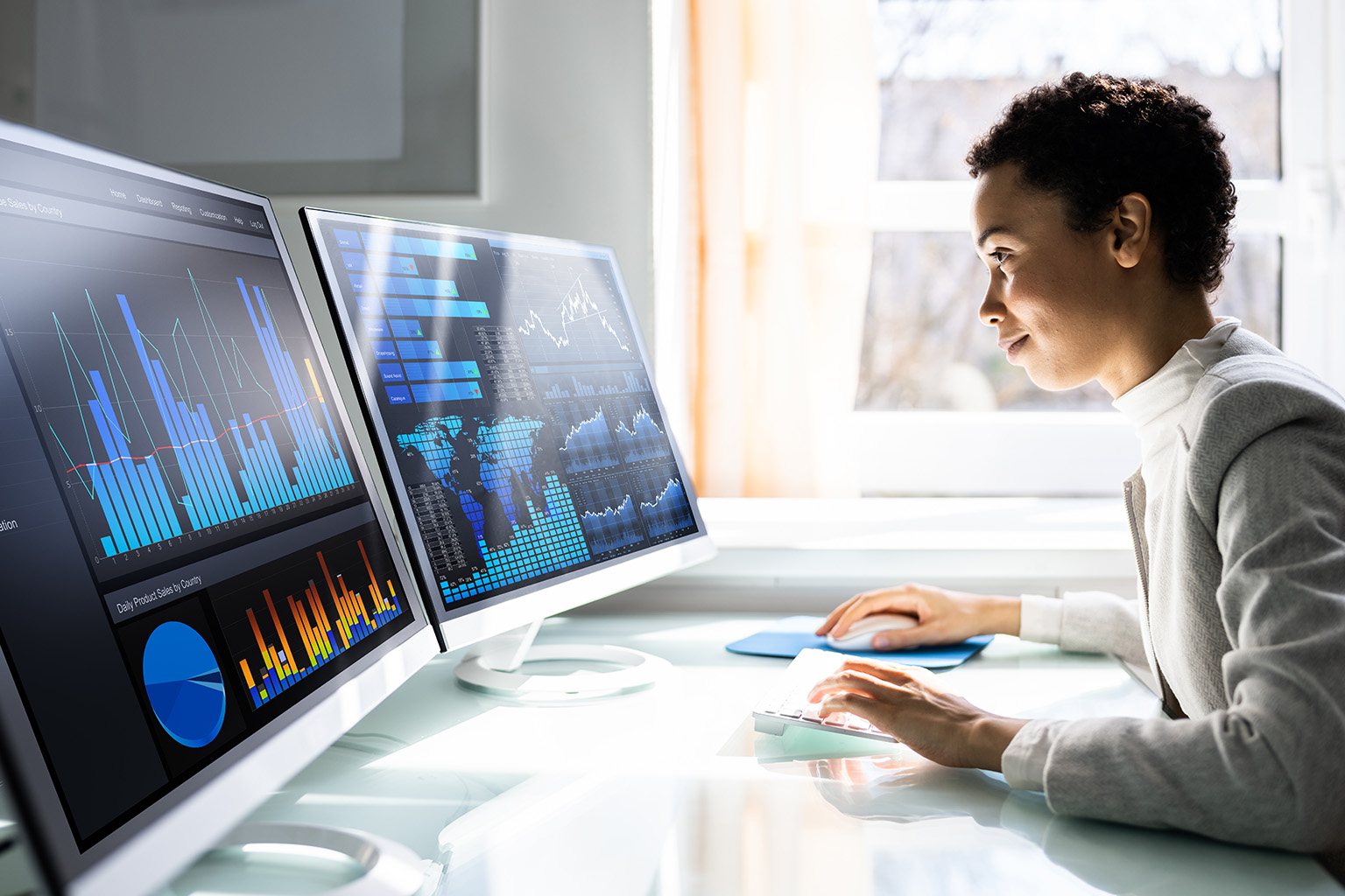 Woman working on computer data analytics