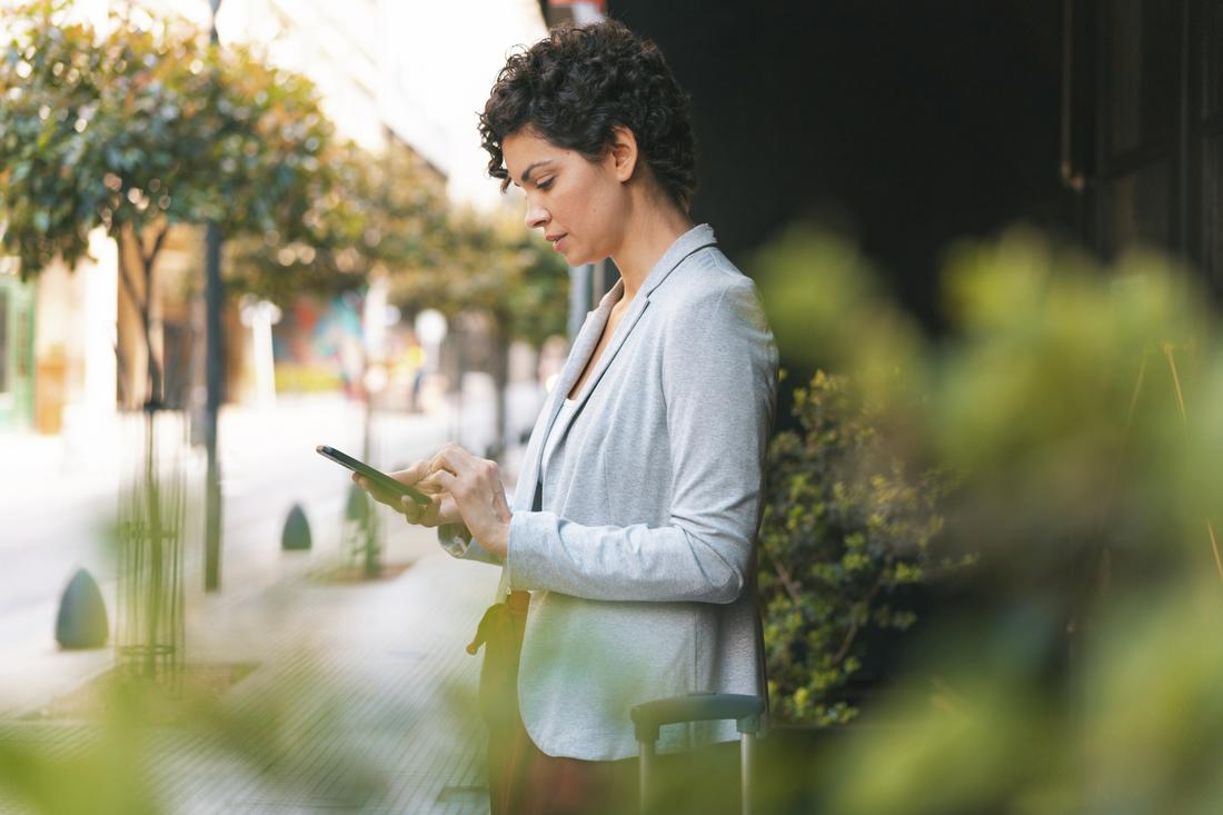 Woman working on her mobile