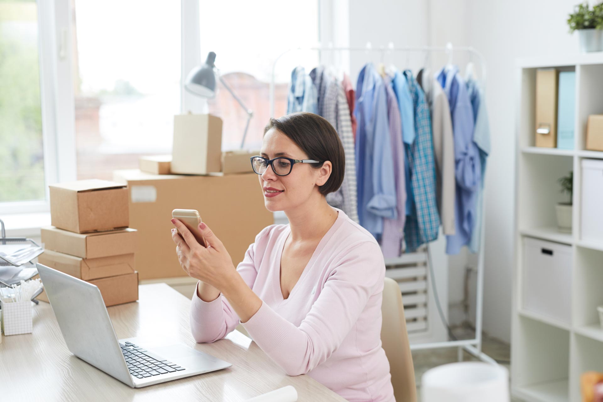 Sole proprietor business owner on her phone