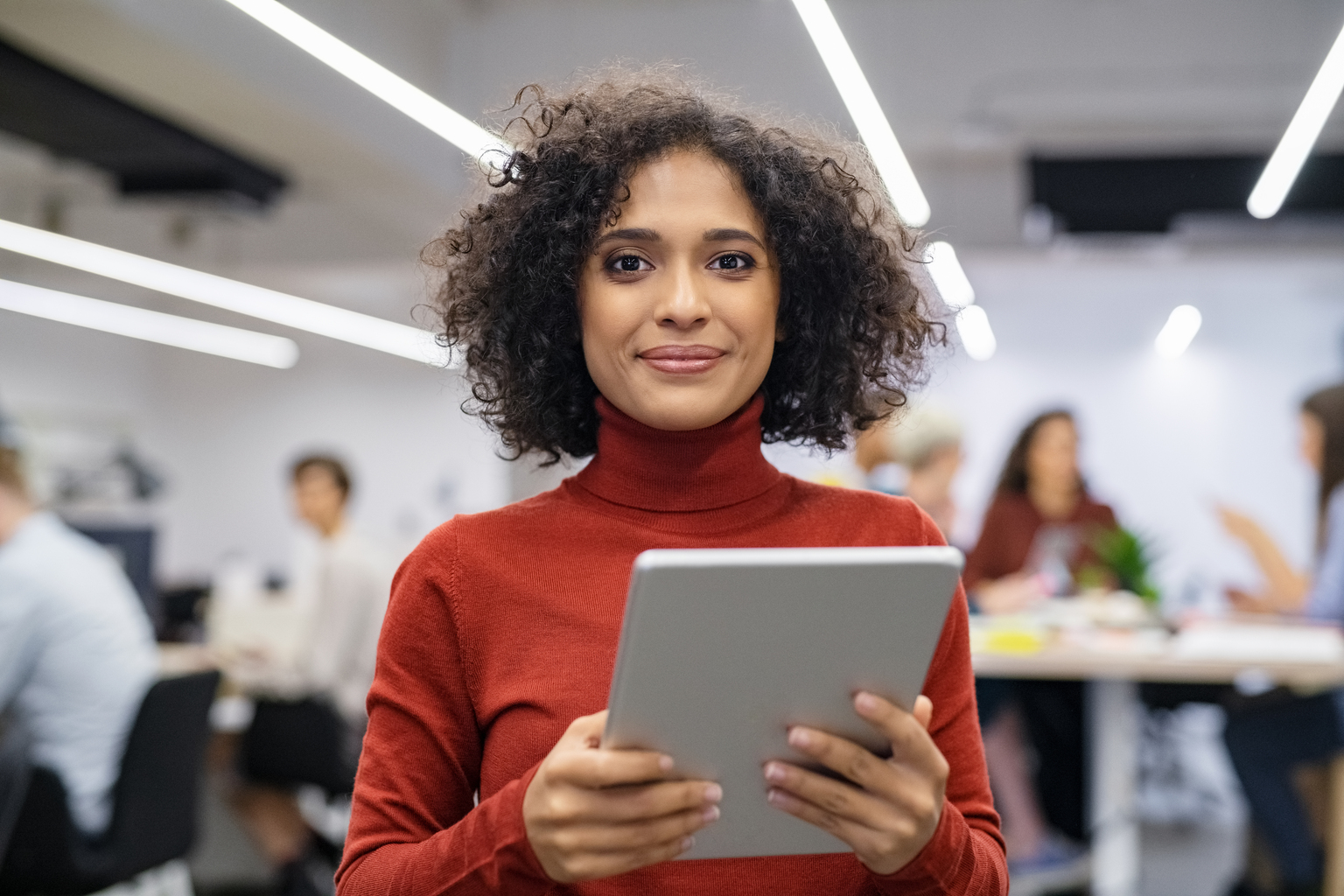 Mixed race young woman using digital tablet 