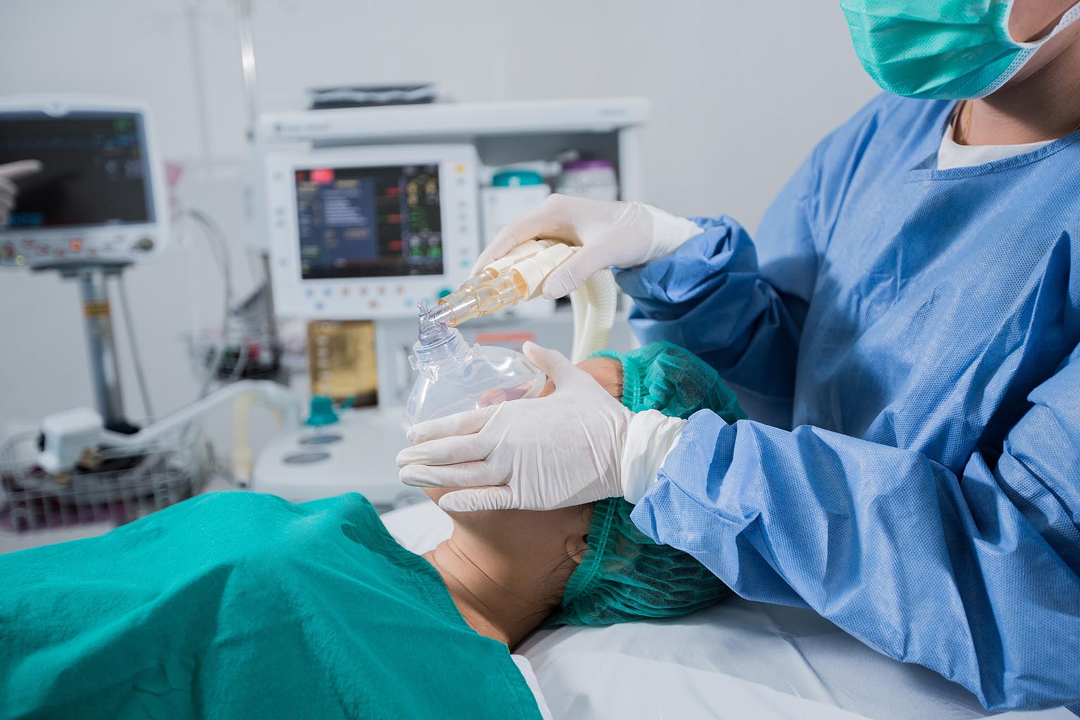 anesthesiologist with patient