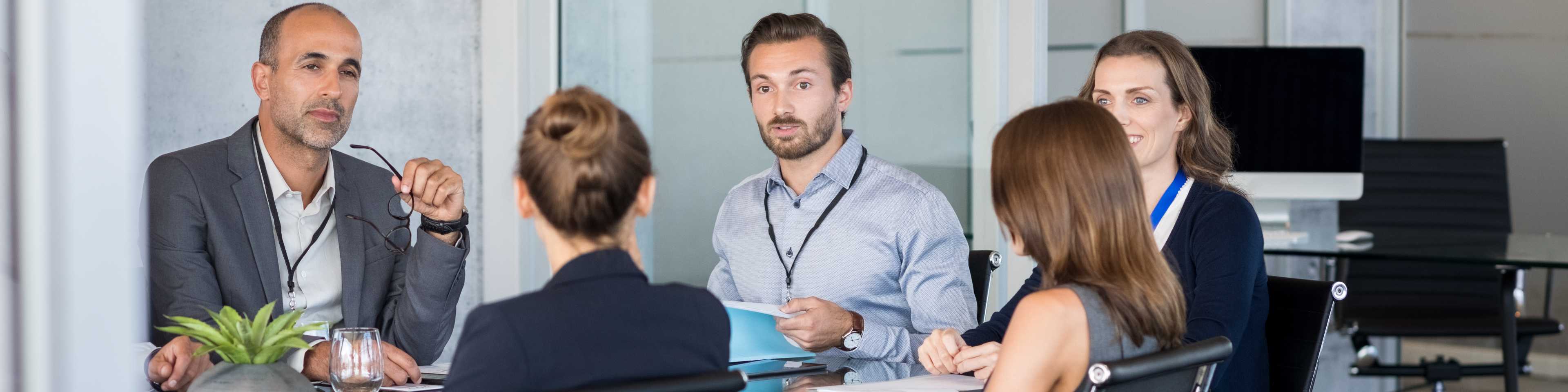 Group meets at office table