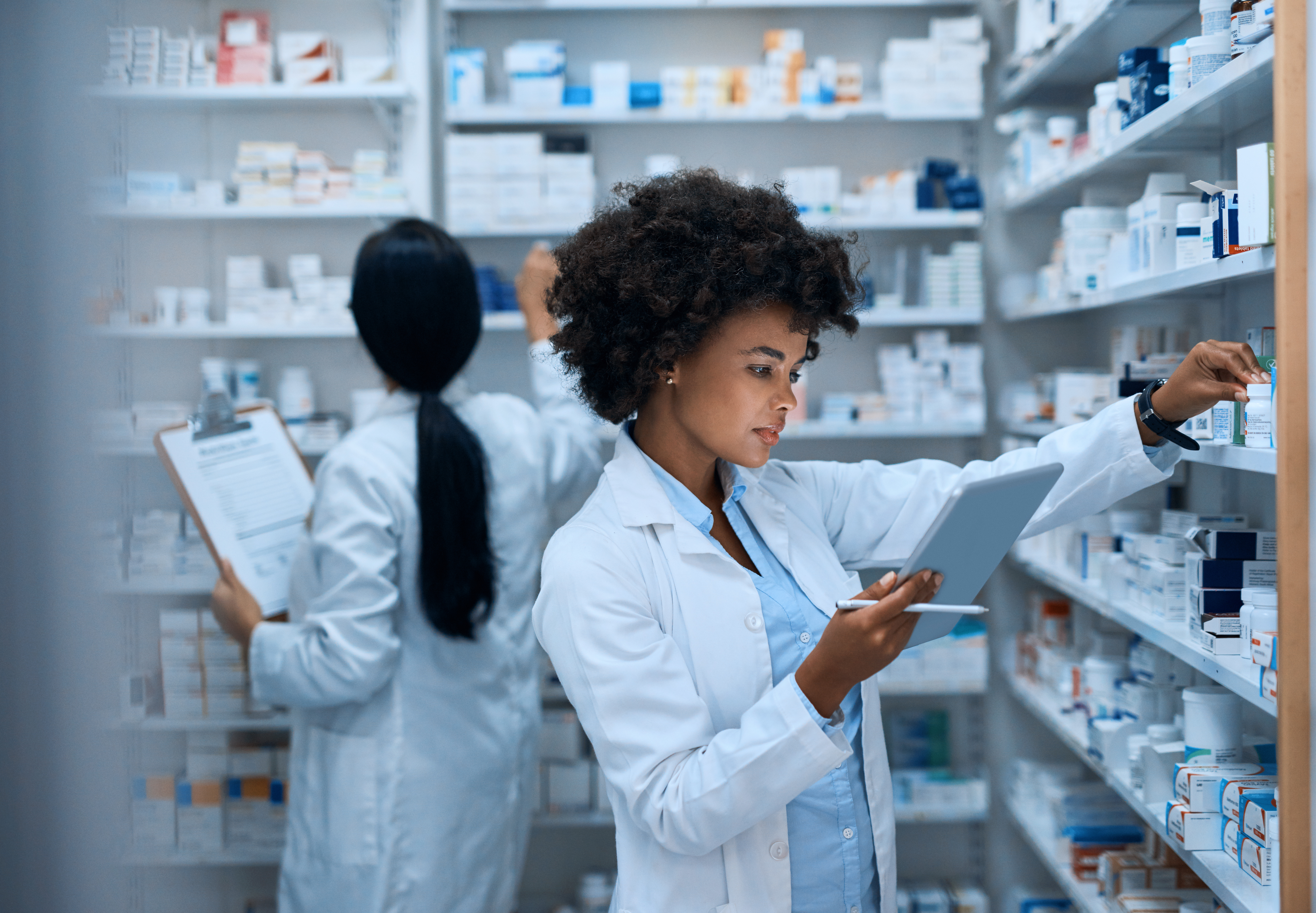 Pharmacist staff choosing prescriptions