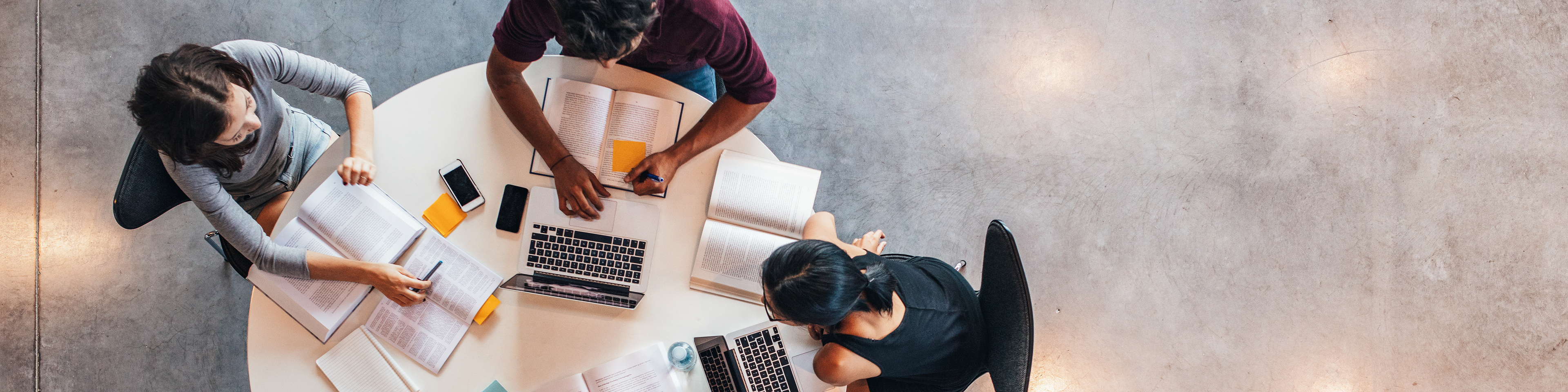 Students studying around a table