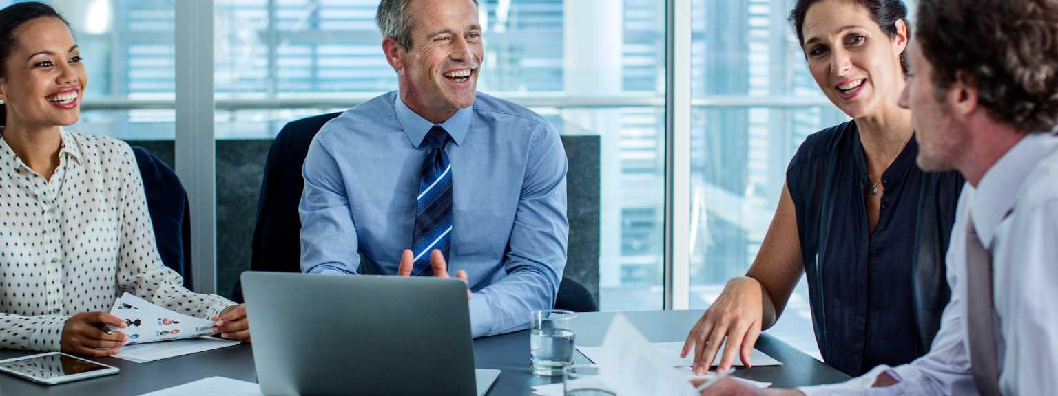 Group of professionals meet at office table