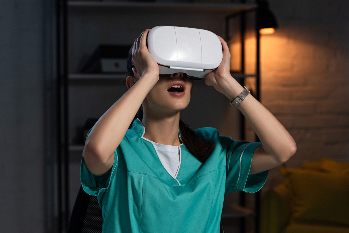 Nursing student uses vrClinicals while wearing virtual reality headset