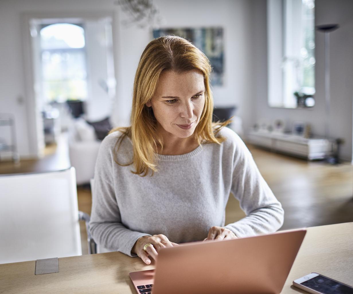 Woman working from Home on a Laptop