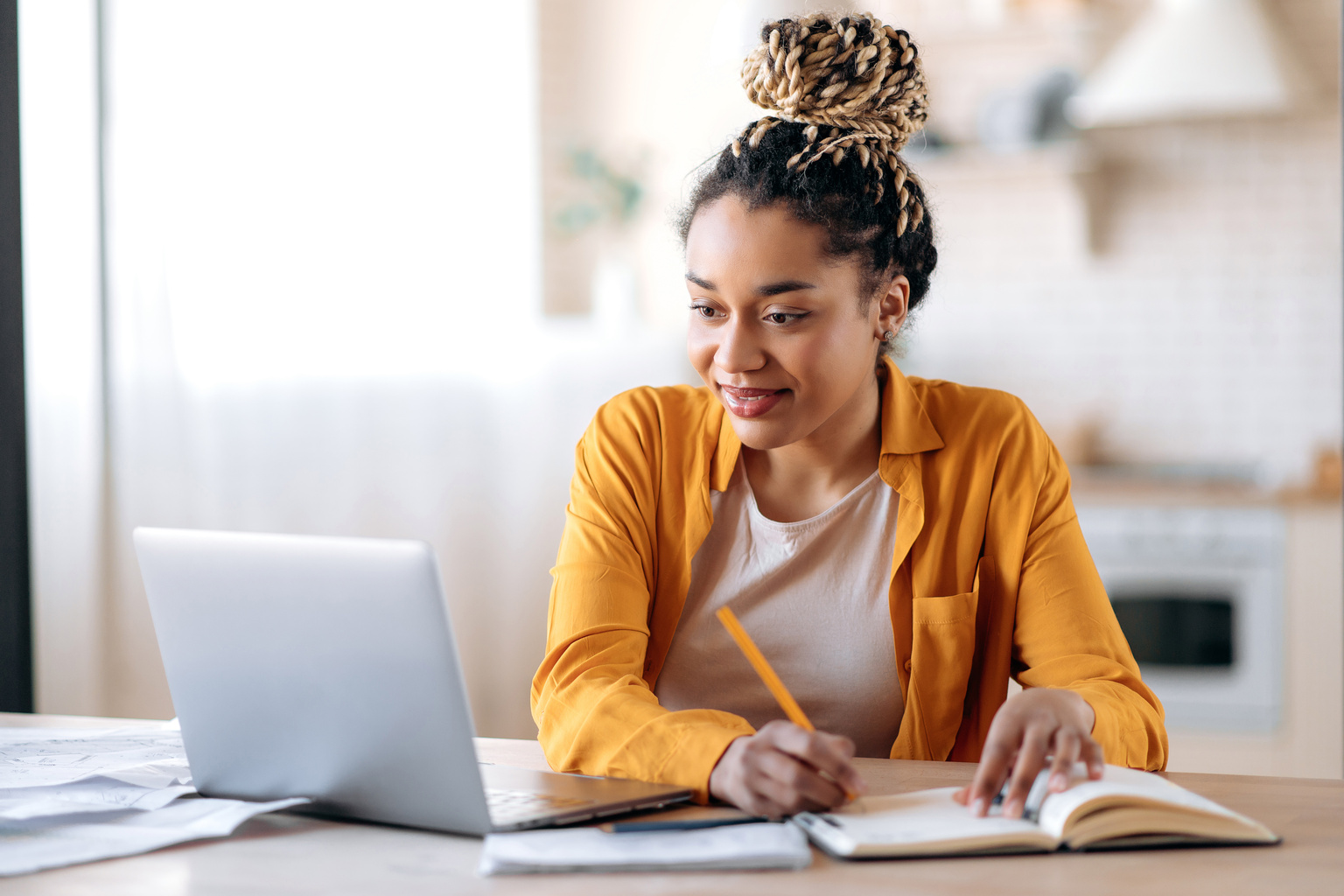 Medical student using product on laptop