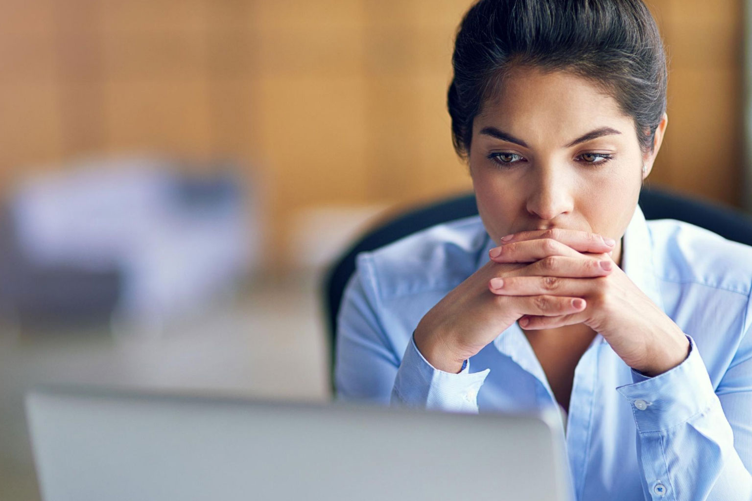 Woman concentrating on screen looking at CCH GDPR Compliance