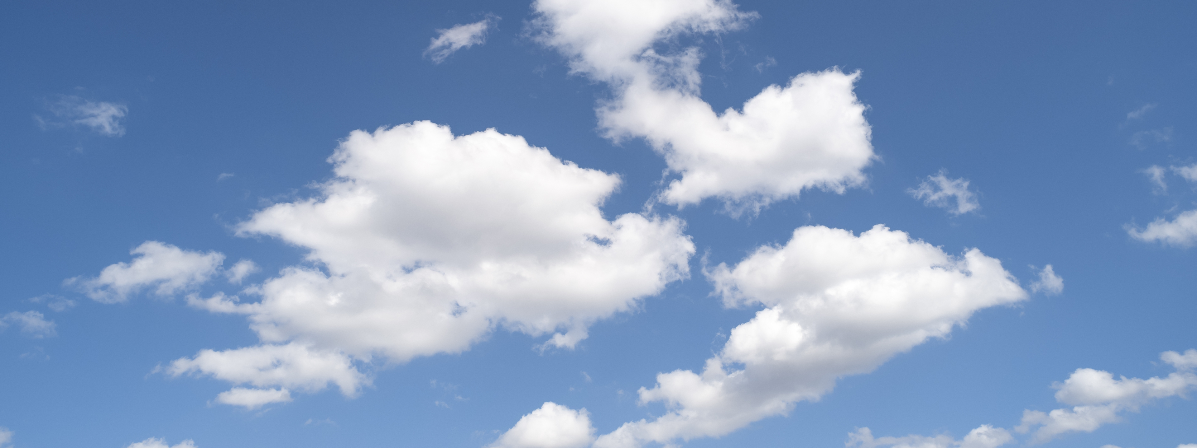 White colour clouds against blue sky