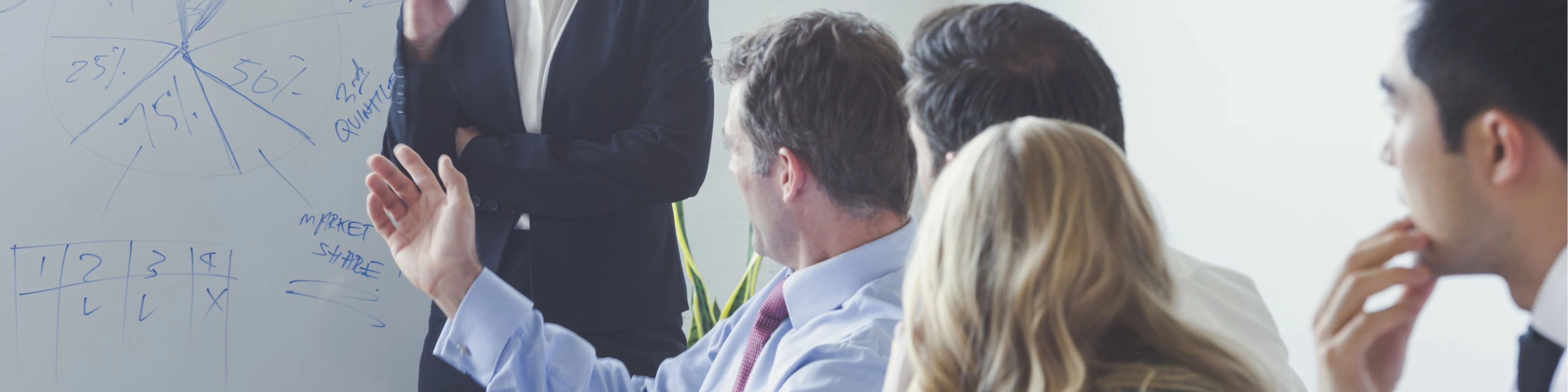 Group of business people in a boardroom presentation