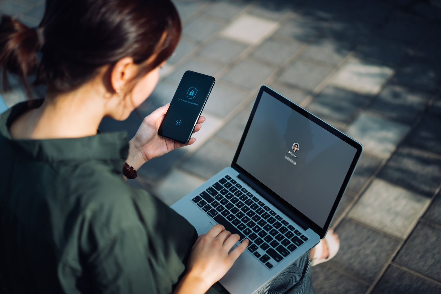 Woman approving the Authenticator to login