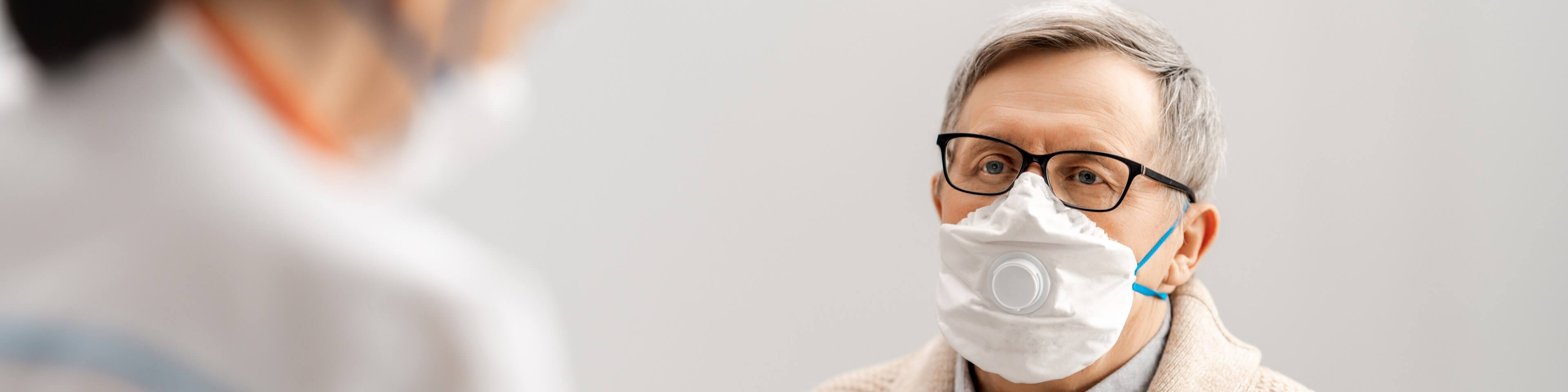 Patient wearing a mask during a doctor's appointment