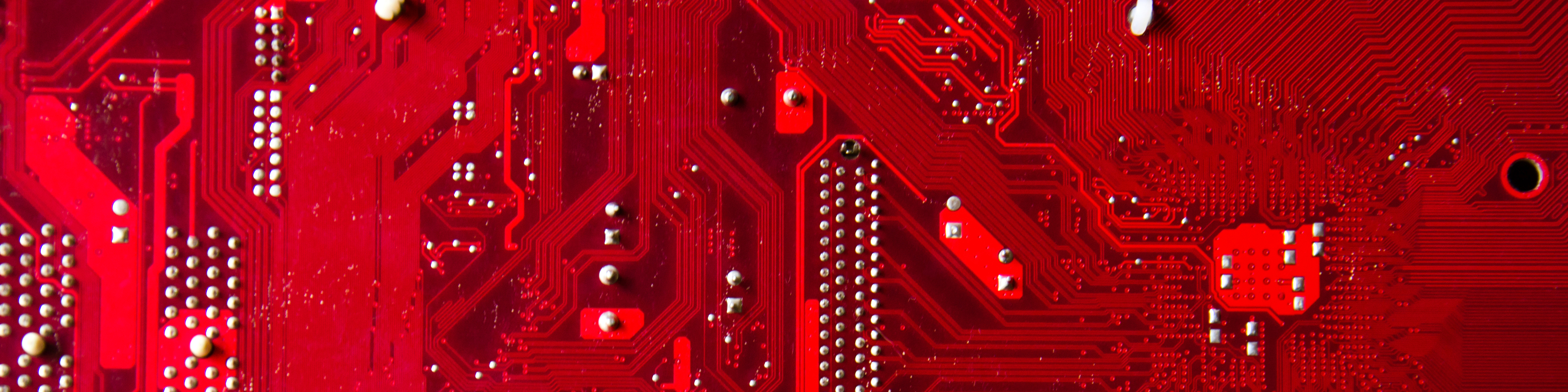 Close-up of a red computer circuit board