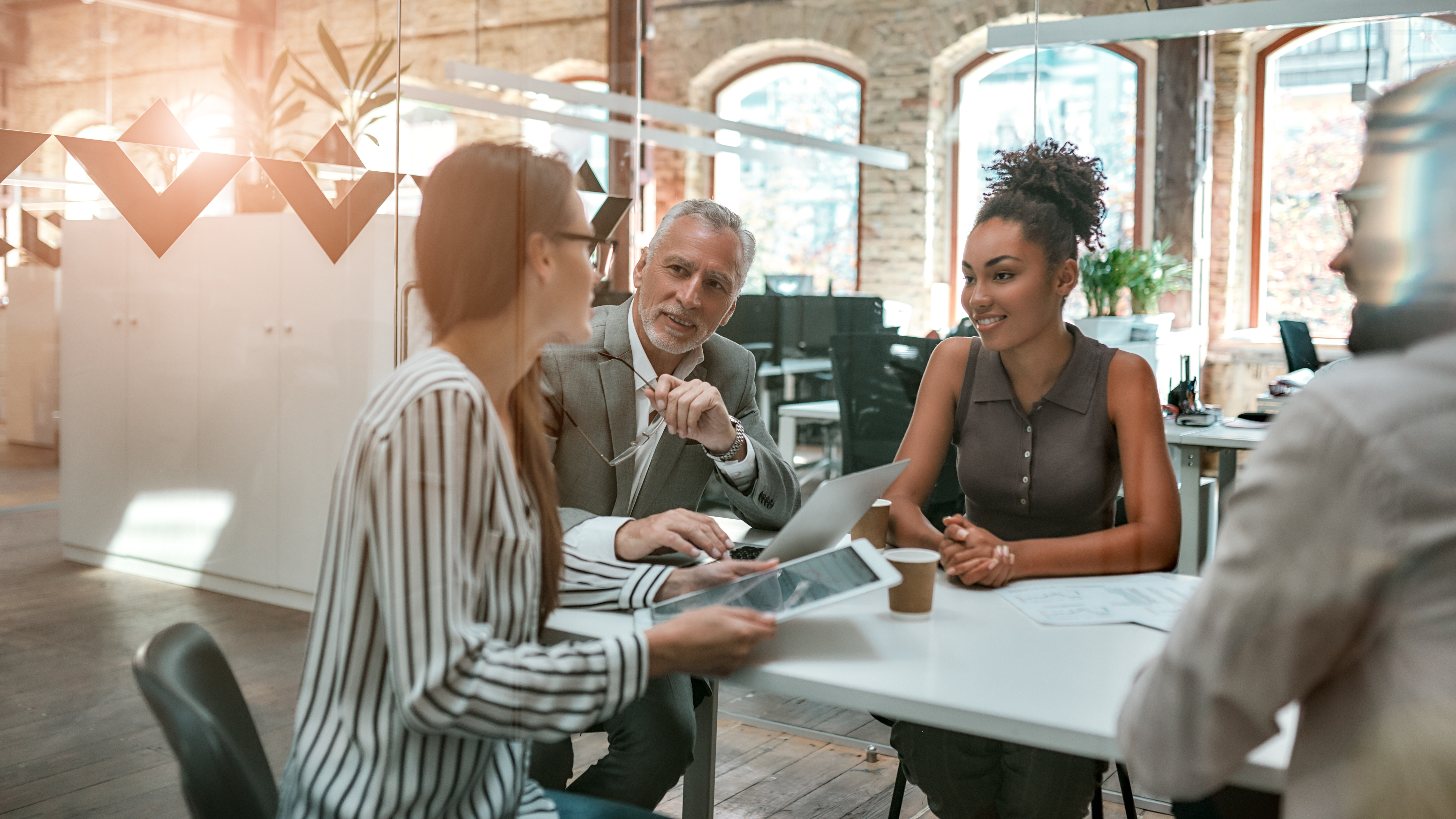 Diverse group business meeting