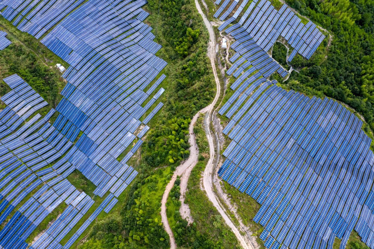 Aerial view of the photovoltaic solar power plant on the top of the mountain