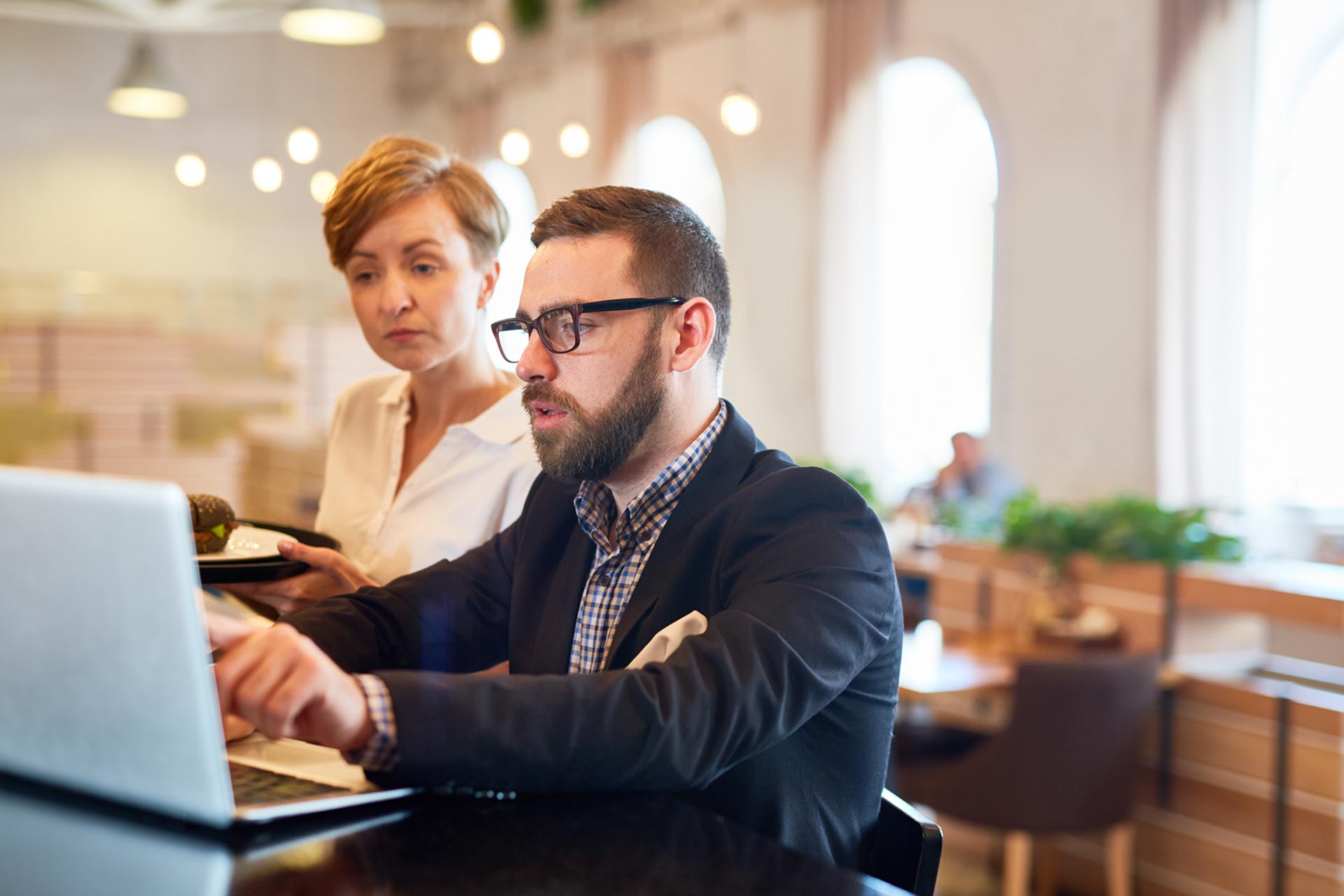 C corporation employees discussing technology