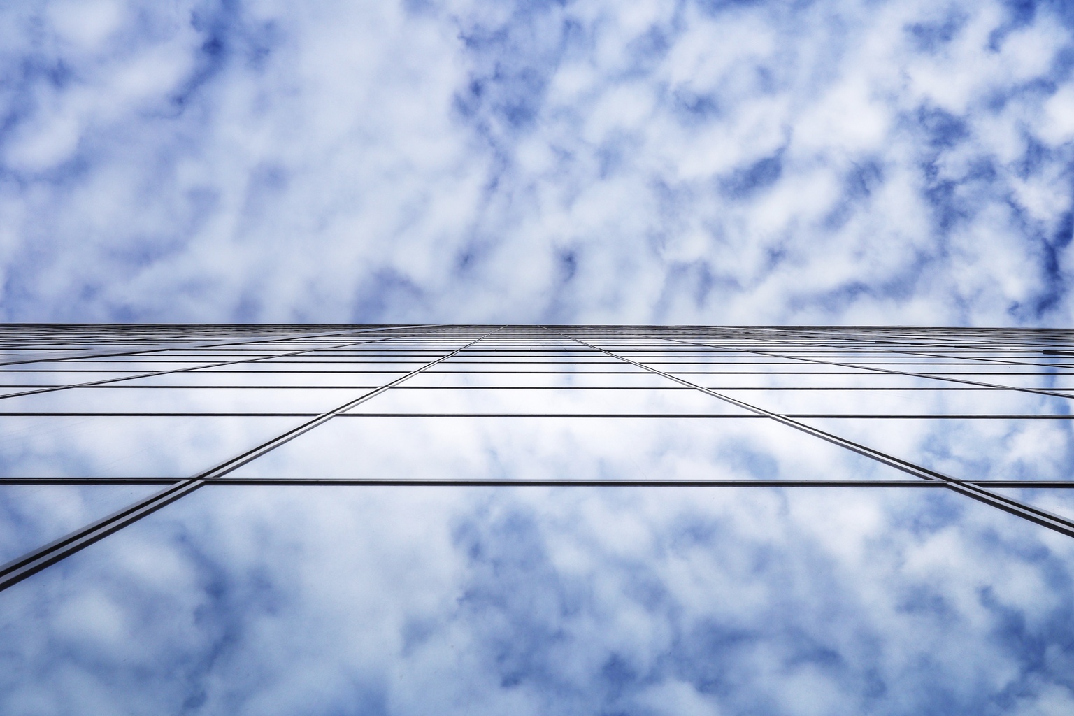 Directly Below Shot Of Modern Building Against Sky in Puteaux, France