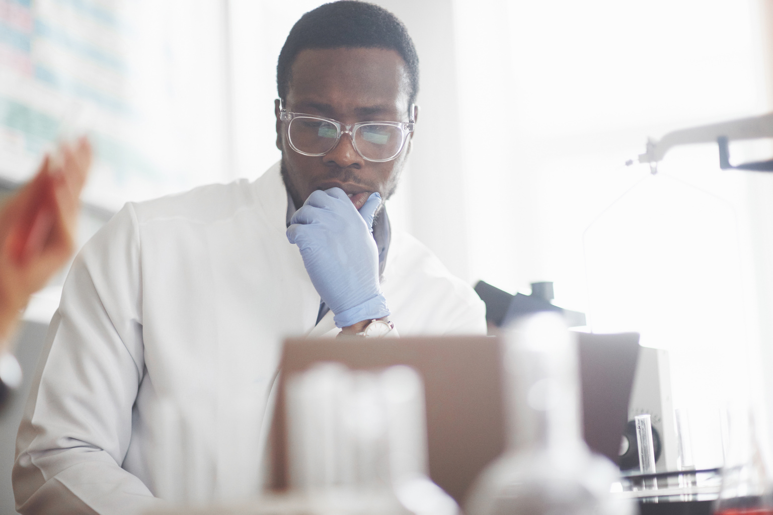 Clinical researcher looking at screen