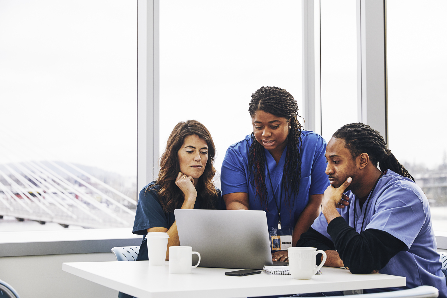 Group of nurses meeting and discussing work