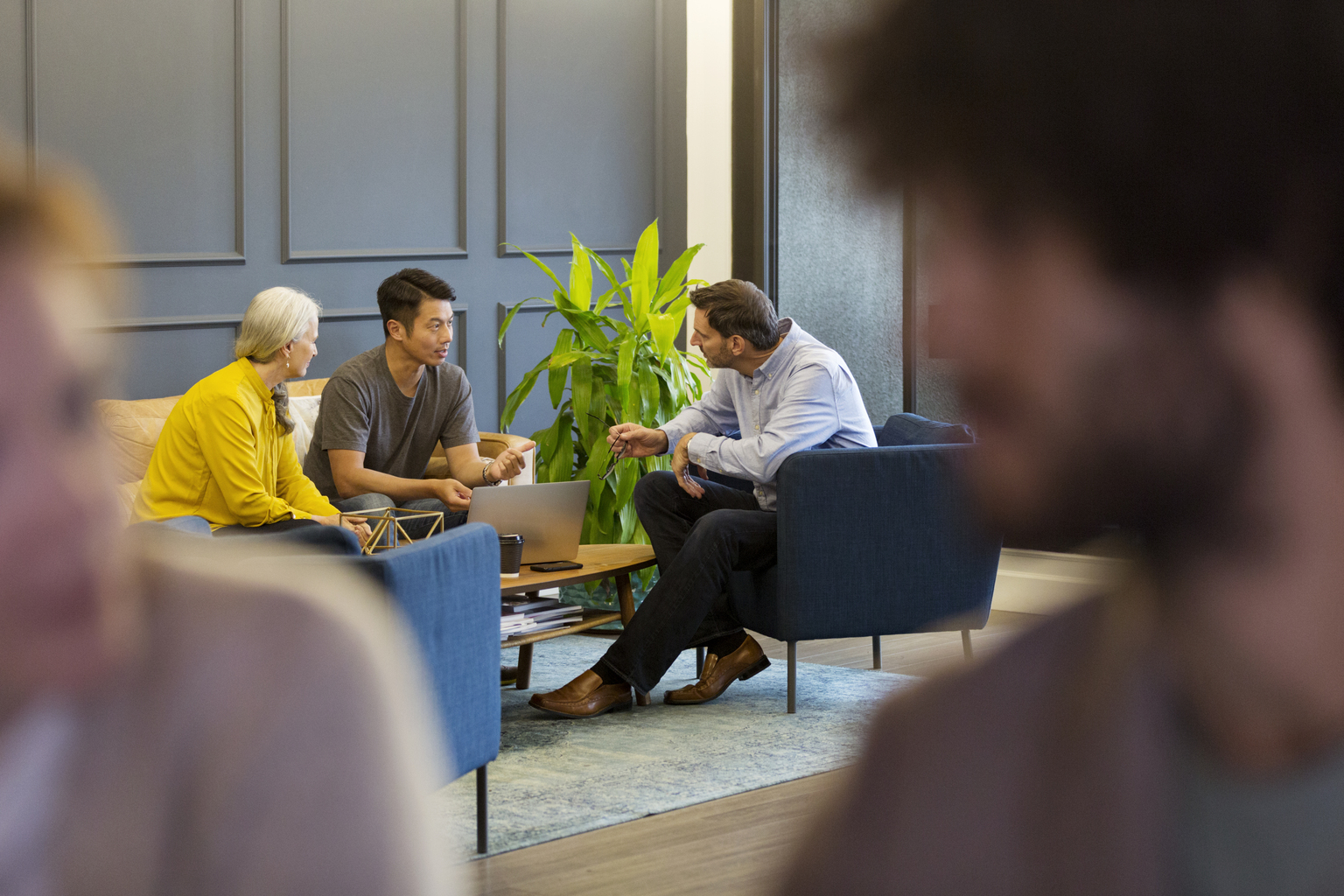 Creative business people having meeting in co-working space