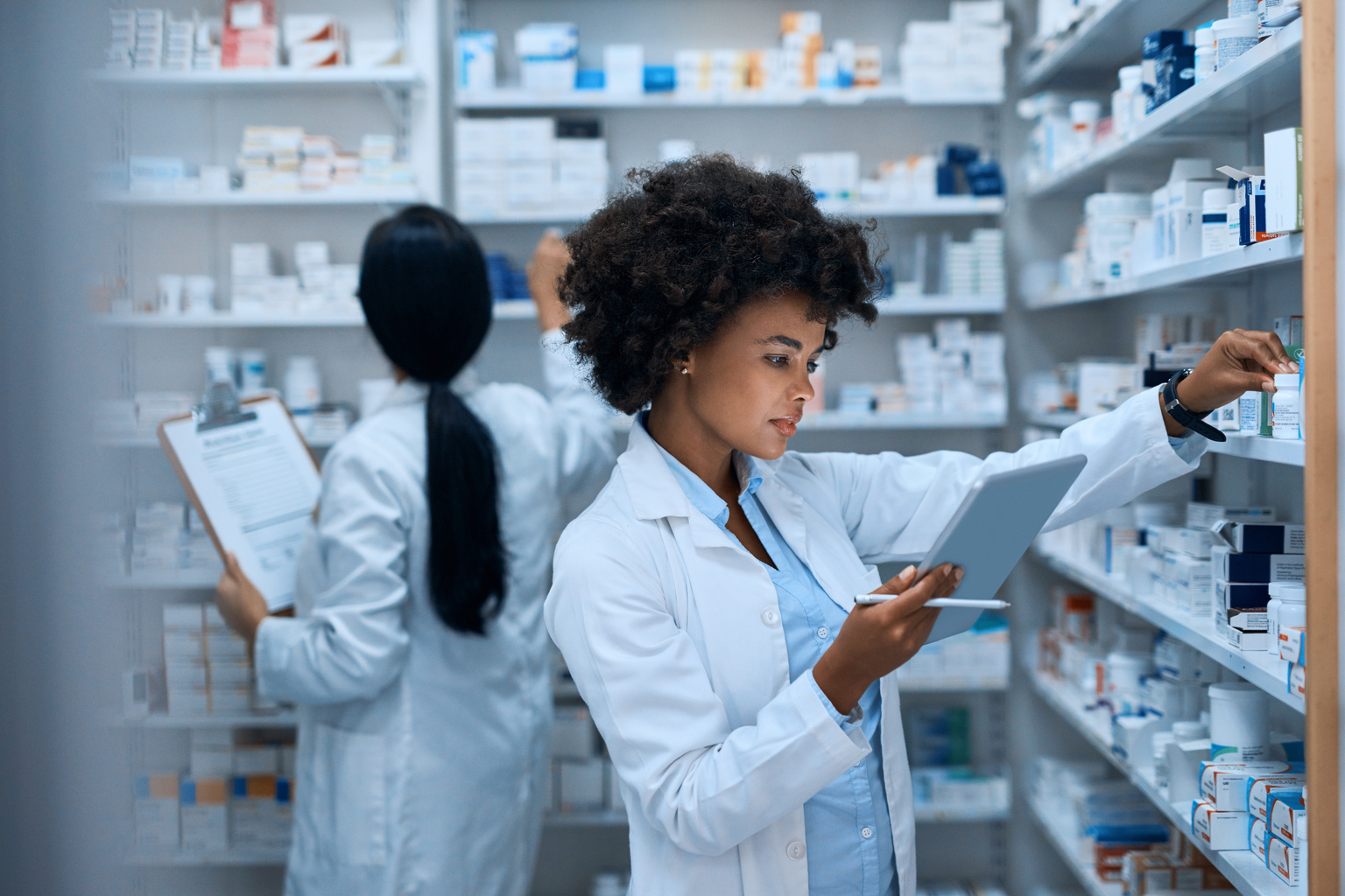 Pharmacist staff choosing prescriptions