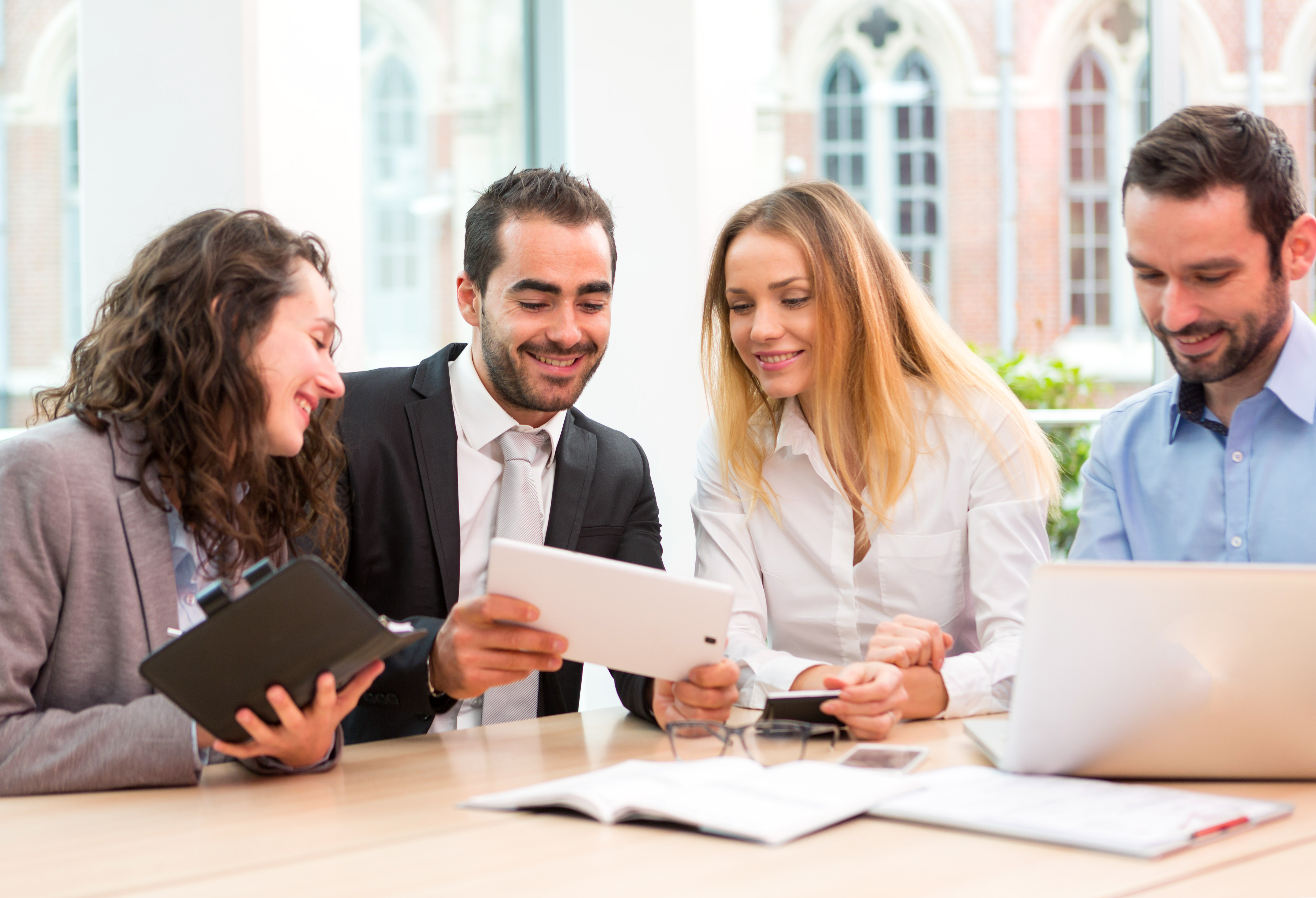 Group of business people working together at the office